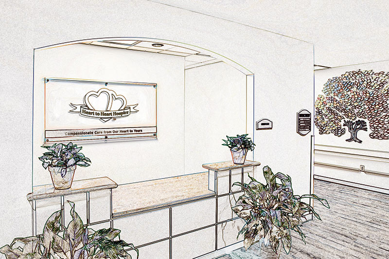San Antonio Hospice House front desk with logo and plants