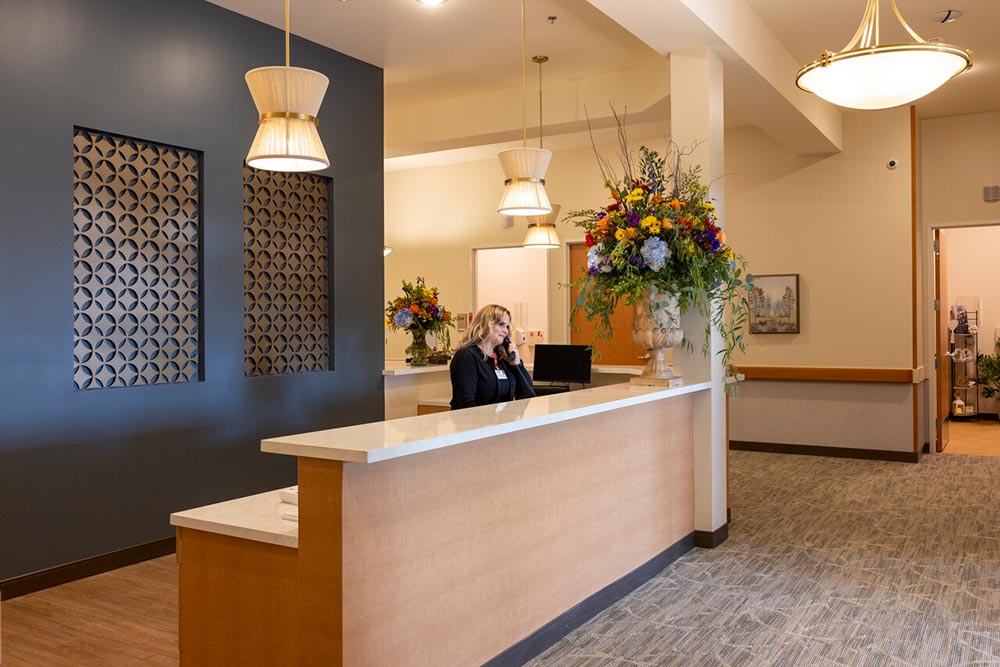San Antonio Hospice House room with bed and chairs